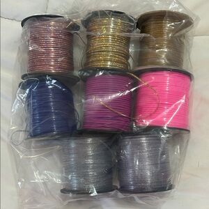 Rexlace Craft Lacing set of 7 opened: gold, pink, purple, silver